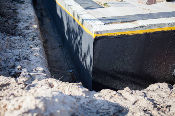 Professional Waterproofing technician working in Springfield, NJ